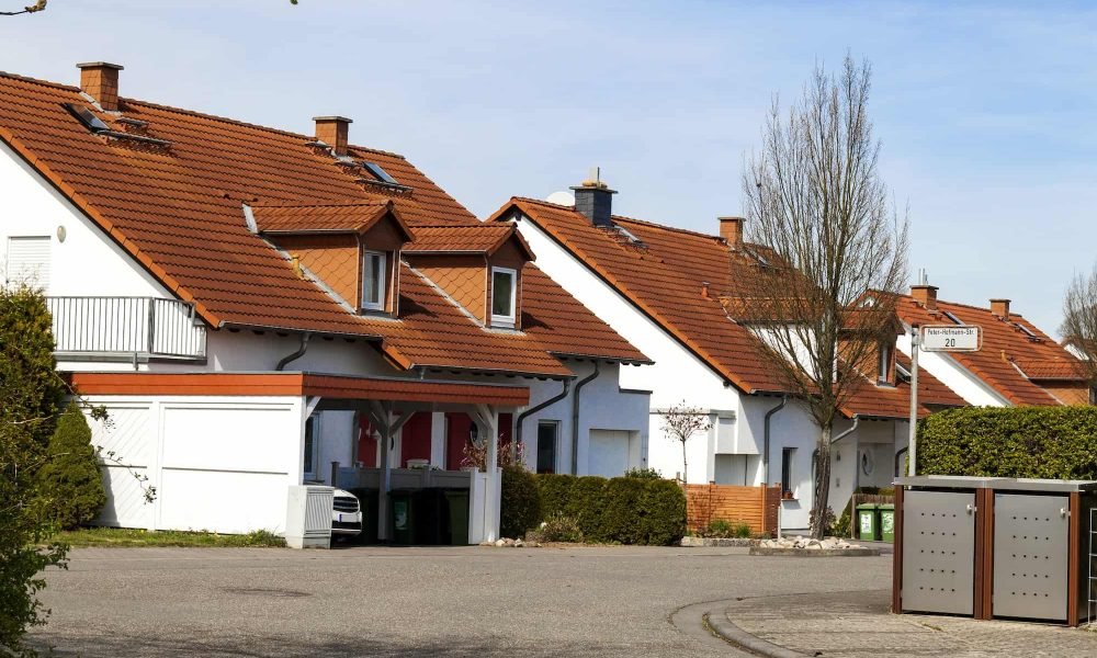 classic-german-residential-houses-with-orange-roofing-tiles-and-windows.jpg