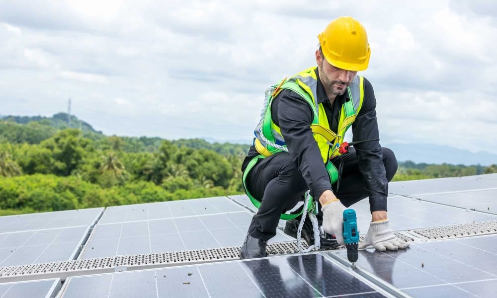 engineer-working-setup-solar-panel-at-the-roof-top-1-1.jpg